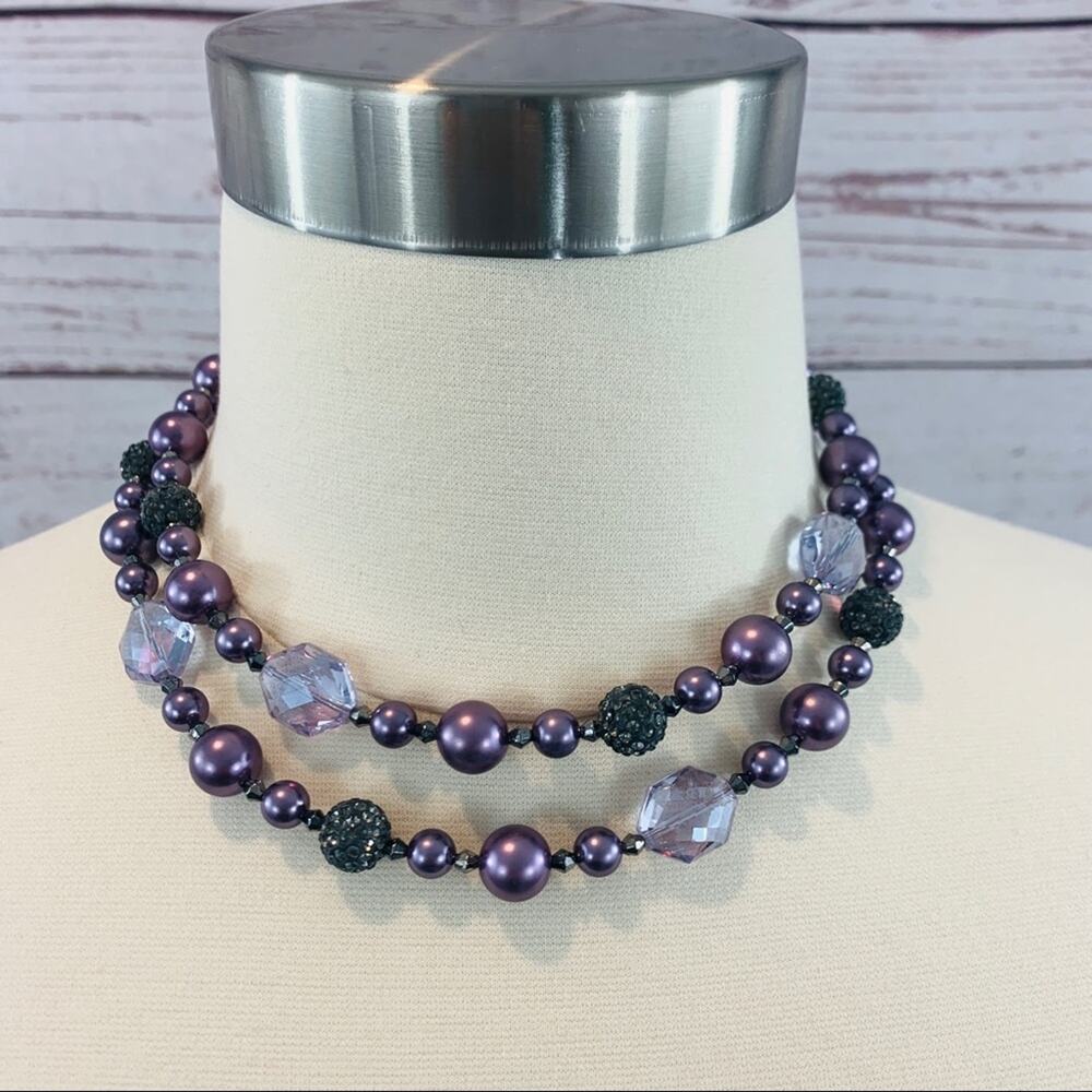 Purple beaded necklace with silver rhinestone bead